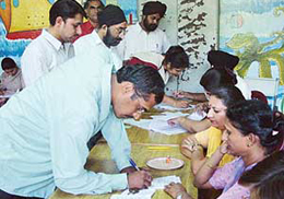 A voter at a polling booth for the Panjab University Senate poll in Chandigarh on Sunday.
