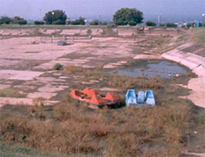 Pedal boats getting demaged in the dry artificial lake near Bahu Fort in Jammu. 