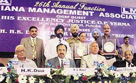 The Tribune Group Editor-in-Chief H. K. Dua, Ludhiana Management Association president M.C. Munjal and Punjab Governor O.P. Verma