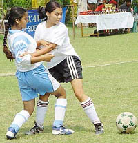 Girls in action during a six-a-side football match between GMSSS-35 and GMSSS-23 at St. Xaviers School, Sector-44, Chandigarh, on Monday. 