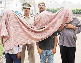 The police produces the three accused of the murder of industrialist Rajan Bhuchar in a Panchkula court on Monday.