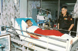 Major-Gen S.K. Kaul, Commandant, Command Hospital, with a patient in the ICU.