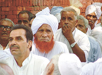 Villagers of Delhi at Kissan Panchayat under the banner of Delhi Gramin Vikas Panchayat, demonstrating against house tax at Jantar Mantar in the Capital on Monday.