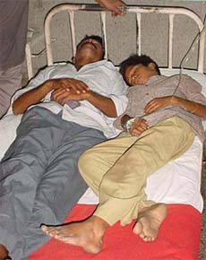 Two of the injured persons share a bad in the Zonal Hospital, Hamirpur
