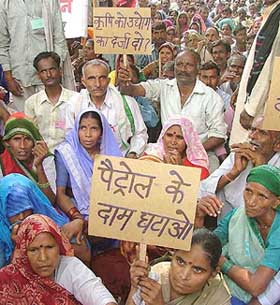 Farmers from different parts of the country under the banner of the Indian Farmers Organisation participate in a rally