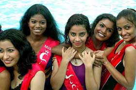 Models pose during a beauty contest