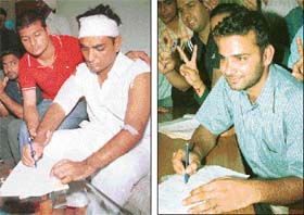 ABVP candidate Gurparvez Singh Sandhu and SOPU candidate Ranjeet Singh Raju file nomination papers on Tuesday