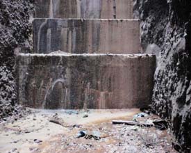 Water leaks from the bottom of a dam in the Patlander area of Hamirpur.