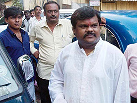Republican Party of India candidate from Chembur, North-East Mumbai, Deepak Nikhalje, brother of underworld don Chhotta Rajan, poses for a photograph after filing his nomination on Monday