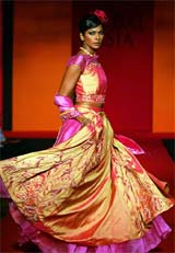 A model displays a creation during the Bridal Asia 2004 show