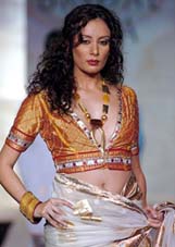 A model shows Shabari Dattas bridal wear at Bridal Asia 2004, a fashion show, in New Delhi on Thursday. 