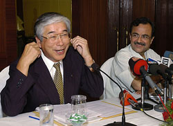 Suzuki delegation chief and Chairman of Maruti Udyog Limited S. Nakamichi (L) and Maruti Udyog Limited Managing Director Jagdish Khattar talk to media in New Delhi following the board meeting on Thursday. 