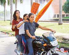 PUSU supporters go around on the campus with the organisations flag after the results. 