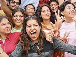Students show victory sign after election results were announced in Panjab University in Chandigarh.