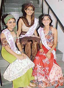 Students of NIIFT Mohali display their winning evening wear designs in Mohali on Friday. 