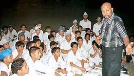 Former Indian wicket keeper Syed Kirmani interacts with budding cricketers at Cricket Stadium, Sector 16, in Chandigarh on Friday.