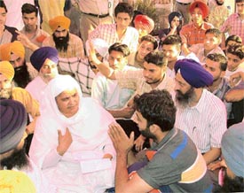SGPC President Jagir Kaur talks to GNDEC students in Ludhiana on Friday