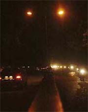 Only one streetlight functions on the road dividing Sectors 34 and 35