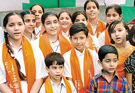 Children present a cultural item at a function organised by the Mahajan Sabha in Chandigarh on Sunday.