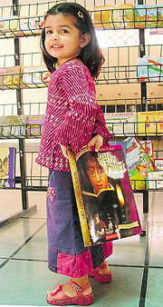 A child holds a Harry Potter book at The Gurukul in Panchkula on Sunday.