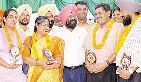 Teachers from Chandigarh were honoured for working for education of slum children at Palsora Colony in Chandigarh on Sunday.