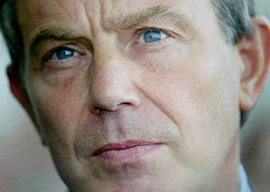 Britain's Prime Minister Tony Blair listens to questions from the media