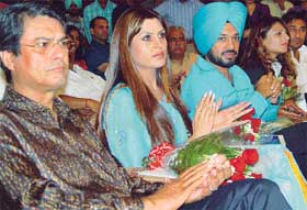 TV and film artistes, including Kanwaljit Singh, Kirandeep Kinmmi, Gurpreet Guggi, Arshveer Bajwa and Harbhajan Maan, at a seminar to celebrate the World Tourism Day at Sector 10 on Monday. 