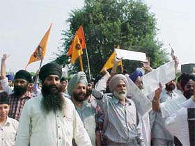 Sikh devotees protest against the attack on Nankana Sahib Gurdwara in Pakistan, in Jammu