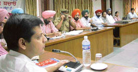 Mr Anurag Verma, Deputy Commissioner, Ludhiana, presides over a meeting to draw up the Pulse Polio programme on Wednesday. 