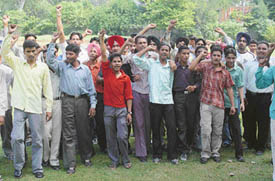 Students protest against harassment by private bus operators in front of the office of the Deputy Commissioner on Wednesday