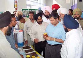 Deputy Commissioner Alok Shekhar at an exhibition organised as part of a farmers’ training camp in Faridkot