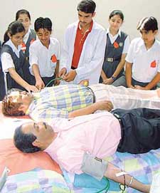  Parents of students donate blood at a camp organised in Bhartiya Vidya Bhavan School, Sector 27, Chandigarh, on Thursday.