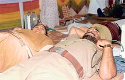 Mr Balbir Singh Chahal, Inspector, and his wife donate blood.