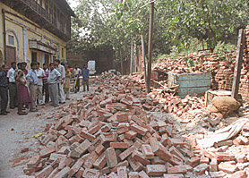 The collapsed wall near Lahore Gate in the Capital on Friday.