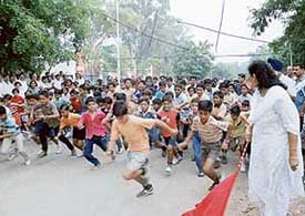 Children participate in a mini marathon organised by No. 3 Base Repair Depot in Chandigarh on Saturday