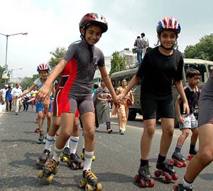 Children take part in Marathon Run for Clean Gujarat, organised on the occasion of Mahatma Gandhi's 135th birth anniversary