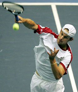 Andy Roddick of the USA serves to Marat Safin of Russia in their semi-final match 