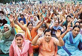 Members of the CHB Residents Federation hold a rally at Sector 40