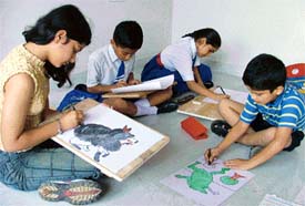 Students participate in a painting competition organised by HOPE-Animal Welfare Society