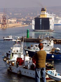 Fishing boats block Marseilles harbour in protest against increasing oil prices on Monday. Several other ports and oil terminals were also blocked along Frances Mediterranean coast.