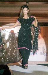 Models walk the ramp during a fashion show in Ludhiana on Sunday