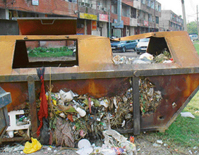 A rusty dustbin at the back of the Sector 20 market.