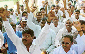 The Chandigarh Safai Karamcharis Union holds a rally at Sector 27 dispensary in Chandigarh on Wednesday. 