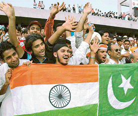 Hockey fans show flags of India and Pakistan painted on one piece of cloth during the match organised at Chandigarh on Wednesday 