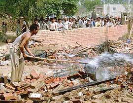 Efforts on to extinguish the fire at the site of the blast which took place in a cracker factory in Bathinda town on Wednesday. 