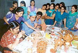 Students of MTS College interact with students at Ek Prayas in Ludhiana on Wednesday.
