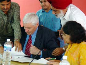 Principal Secretary for Punjab Science and Technology Romila Dubey, Mr Ashley OSullivan, president of Canadian company Ag-West Bio Inc, sign an MoU