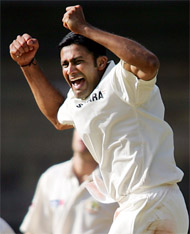 Anil Kumble celebrates after taking Simon Katichs wicket, his 400th in Test cricket