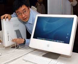 Danny Lam, product marketing manager-desktop and server, Apple Asia Pacific, prepares for a demonstration during the unveiling of the new Imac G5, the world's thinnest  desktop computer in New Delhi on Thursday.