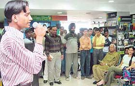 A participant gives audition test for "Singer No 1", organised at Fun Republic